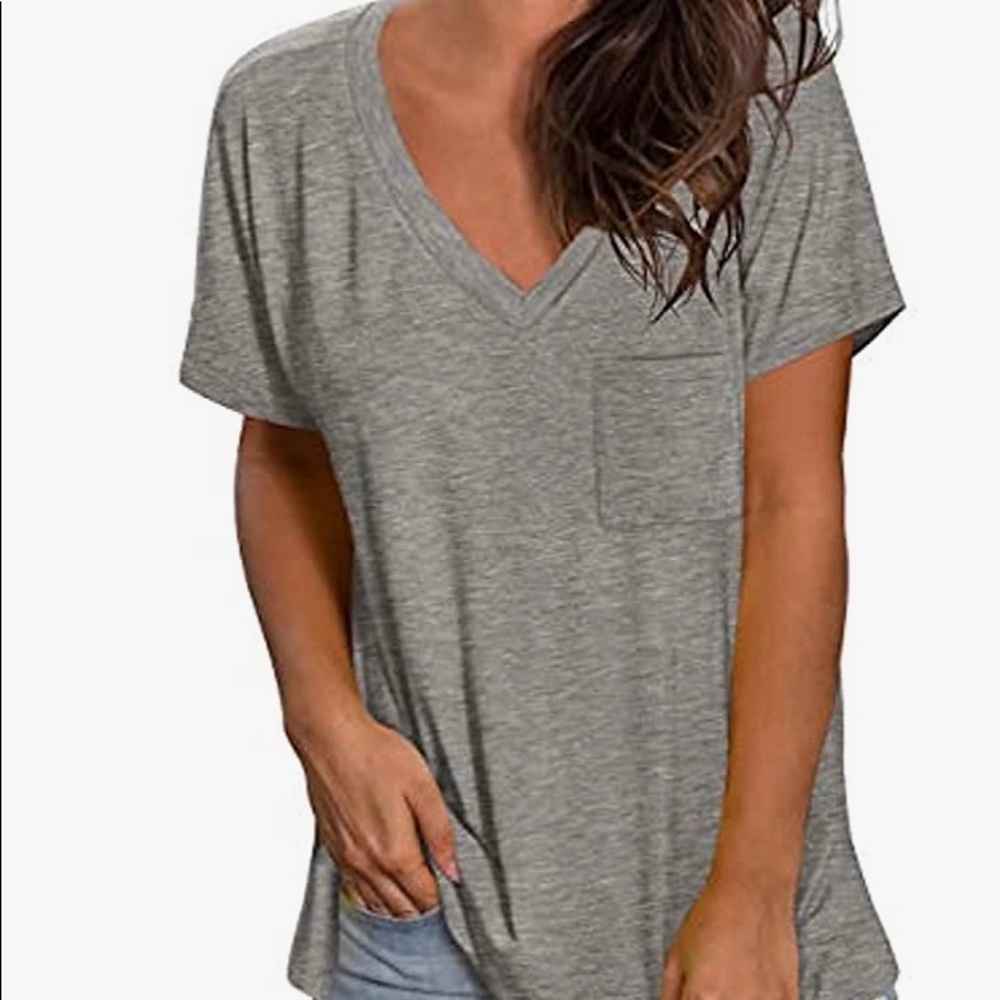 NWOT grey T-shirt medium. Side slits. Pocket super soft feel